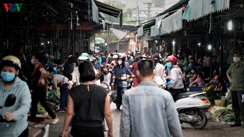 ha noi xet nghiem nhanh covid-19 tai cac cho phung khoang, minh khai hinh 12