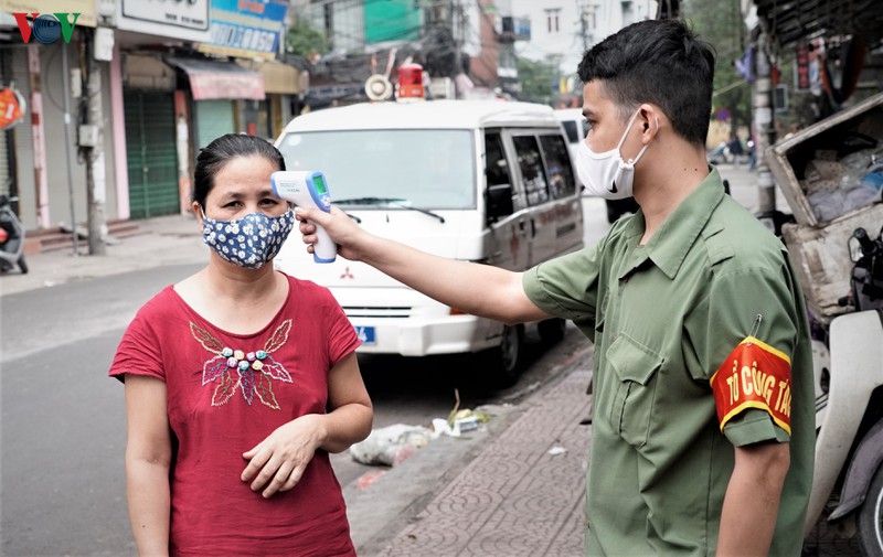 ha noi xet nghiem nhanh covid-19 tai cac cho phung khoang, minh khai hinh 2