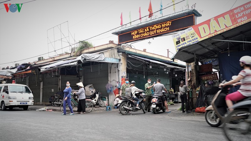 ha noi xet nghiem nhanh covid-19 tai cac cho phung khoang, minh khai hinh 1
