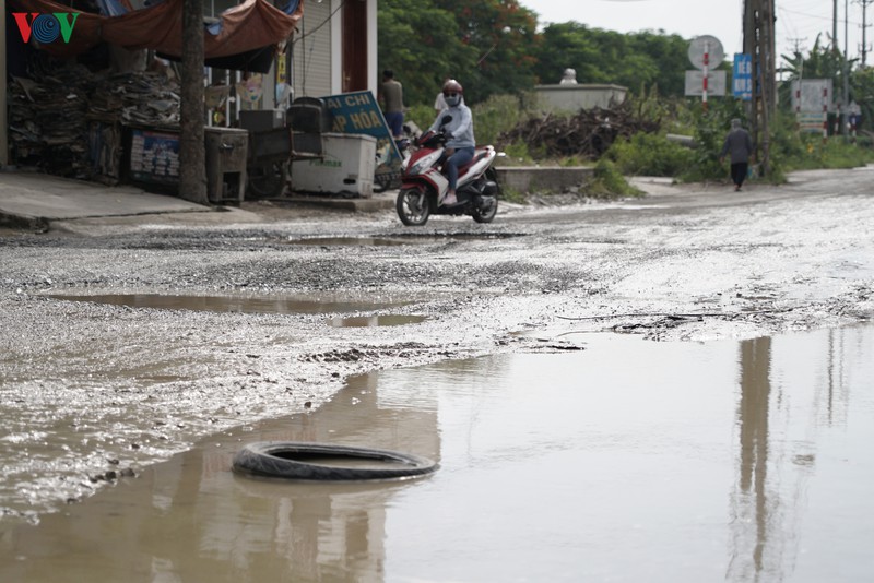 xe tai, container cay nat mat duong, pho keo xuong cap tram trong hinh 6