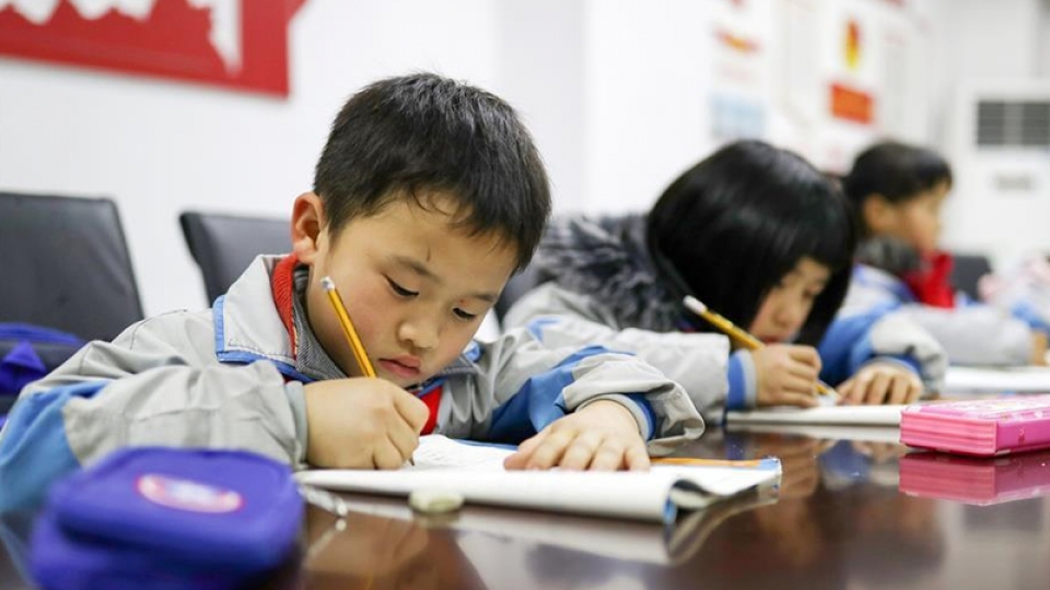 Học sinh tiểu học ở tỉnh Quý Châu, miền Tây Nam Trung Quốc. Ảnh_ Xinhua.jpeg