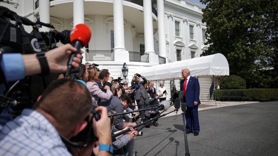 2025-04-03T183407Z_914644672_RC2IQDACRZEJ_RTRMADP_3_USA-TRUMP.JPG