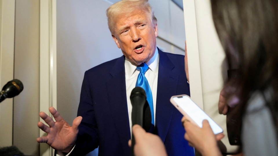 2025-04-06T232050Z_557542039_RC2MSDA73I2P_RTRMADP_3_USA-TRUMP.JPG