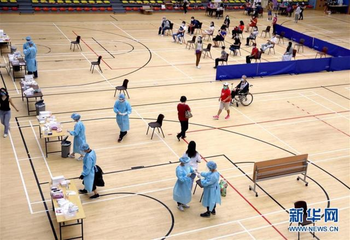 Xét nghiệm Covid-19 trên diện rộng tại Hong Kong. Ảnh: Tân Hoa Xã