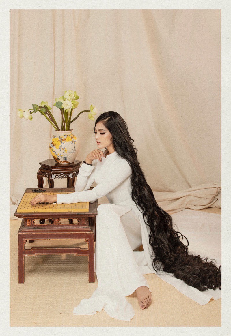truong thi may dep duyen dang trong trang phuc ao dai me may hinh 2