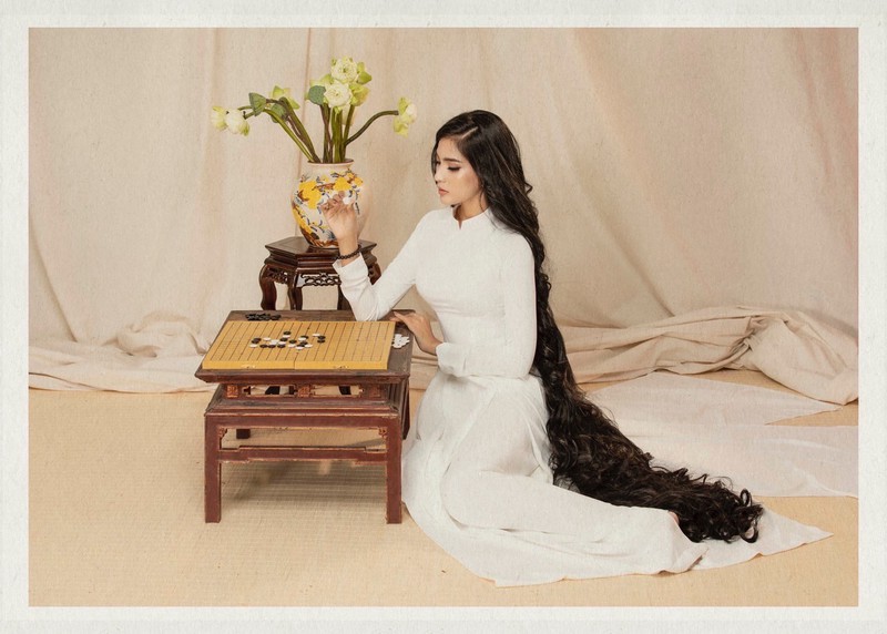 truong thi may dep duyen dang trong trang phuc ao dai me may hinh 6