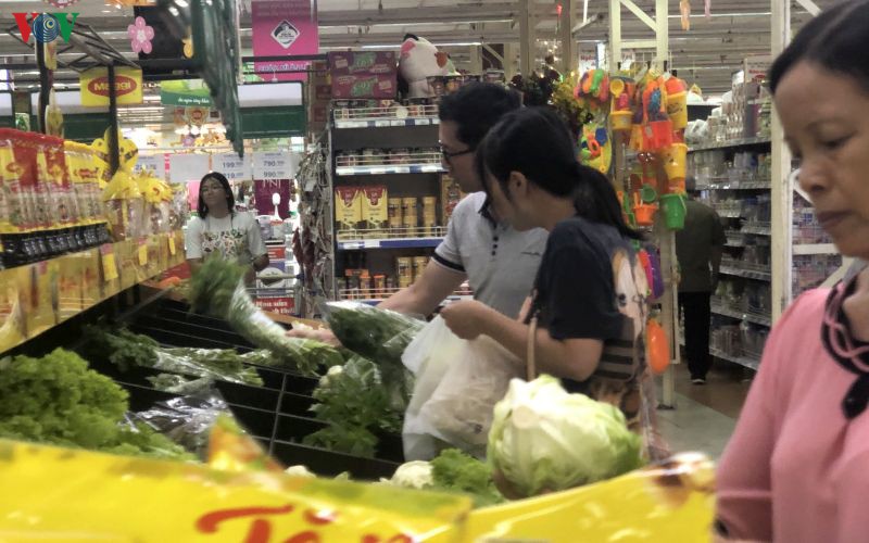 cac cho va sieu thi tai tphcm mo ban tro lai trong ngay mung 2 tet hinh 1