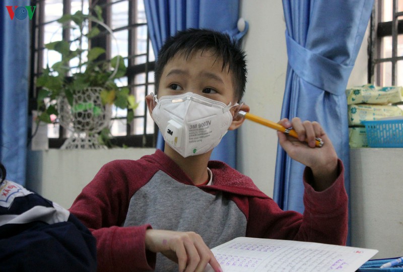 anh: ha noi phun thuoc khu khuan o cac truong phong chong dich corona hinh 16