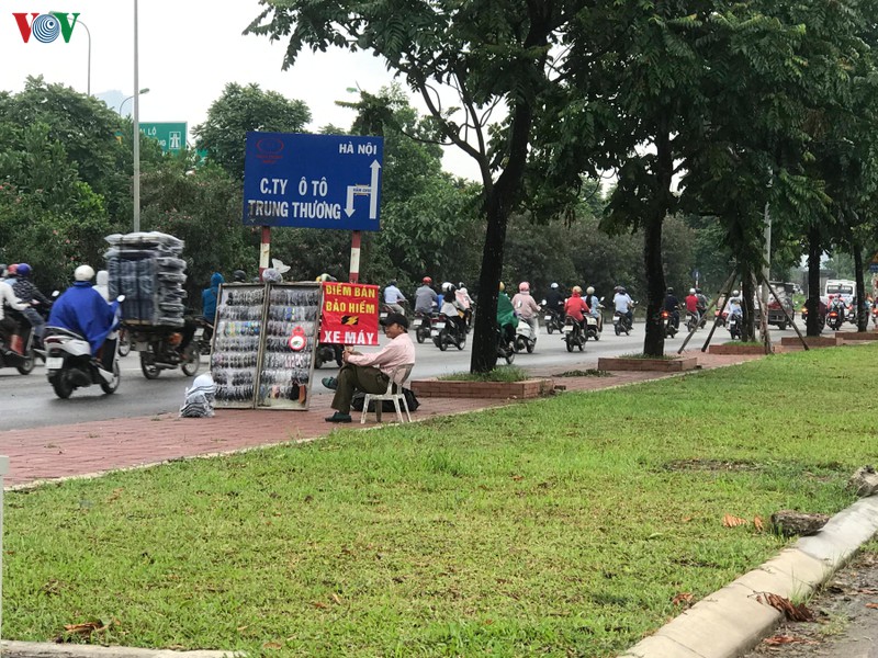 bao hiem xe may nguoi dan mua khi "bat buoc"? hinh 1