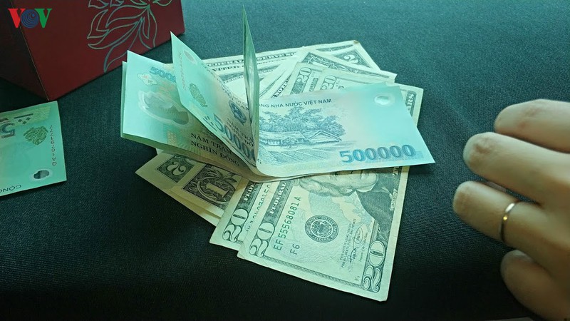 ty gia trung tam cua dong viet nam so voi usd o muc 23.216 vnd/usd hinh 1