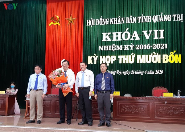mien nhiem chu tich tinh quang tri nguyen duc chinh hinh 1