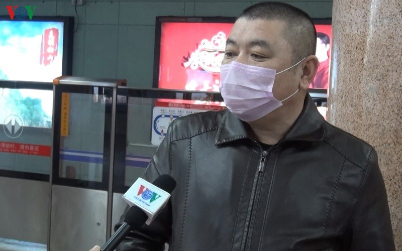 bac kinh "cang minh" chong dich corona truoc ngay di lam sau nghi tet hinh 2