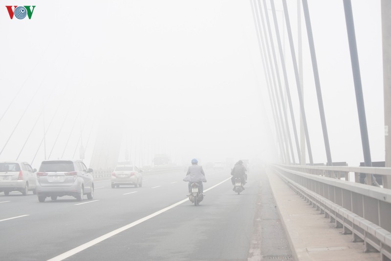 ha noi mit mu trong man suong day dac buoi sang hinh 4