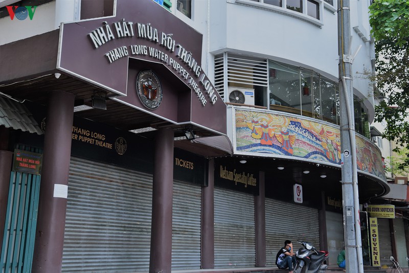 dung hoat dong kinh doanh, khu pho co hoan kiem it nguoi...nhu tet hinh 9