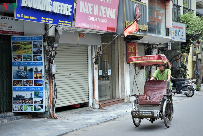 dung hoat dong kinh doanh, khu pho co hoan kiem it nguoi...nhu tet hinh 2