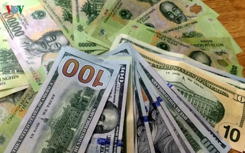 ty gia trung tam giam lien tiep, hien o muc 23.212 vnd/usd hinh 1