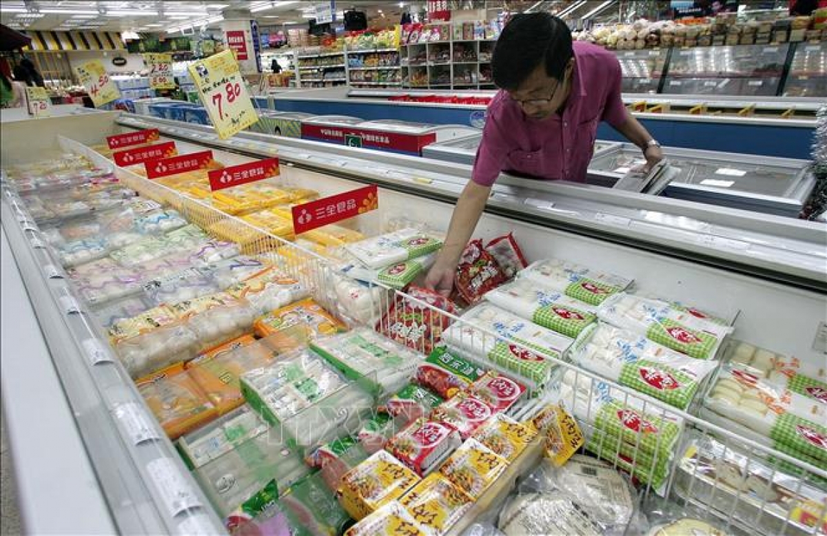 Thực phẩm đông lạnh được bày bán tại siêu thị ở Bắc Kinh, Trung Quốc. Ảnh: AFP/TTXVN