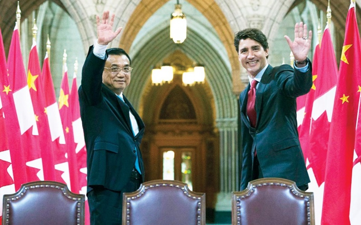 Quan hệ Canada - Trung Quốc hiện đang xấu đi. Trong ảnh: Thủ tướng Canada Justin Trudeau (phải) và Thủ tướng Trung Quốc Lý Khắc Cường tại Ottawa, Canada ngày 22/9/2016 - Ảnh: Adrian Wyld/CP.