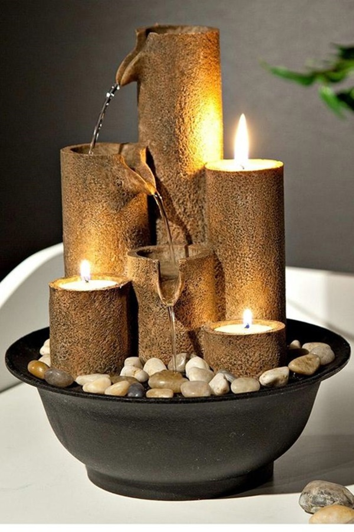 Kiểu dáng nhỏ gọn của đài phun nước mini cho phép nó có thể được đặt ở bất cứ đâu trong nhà./.