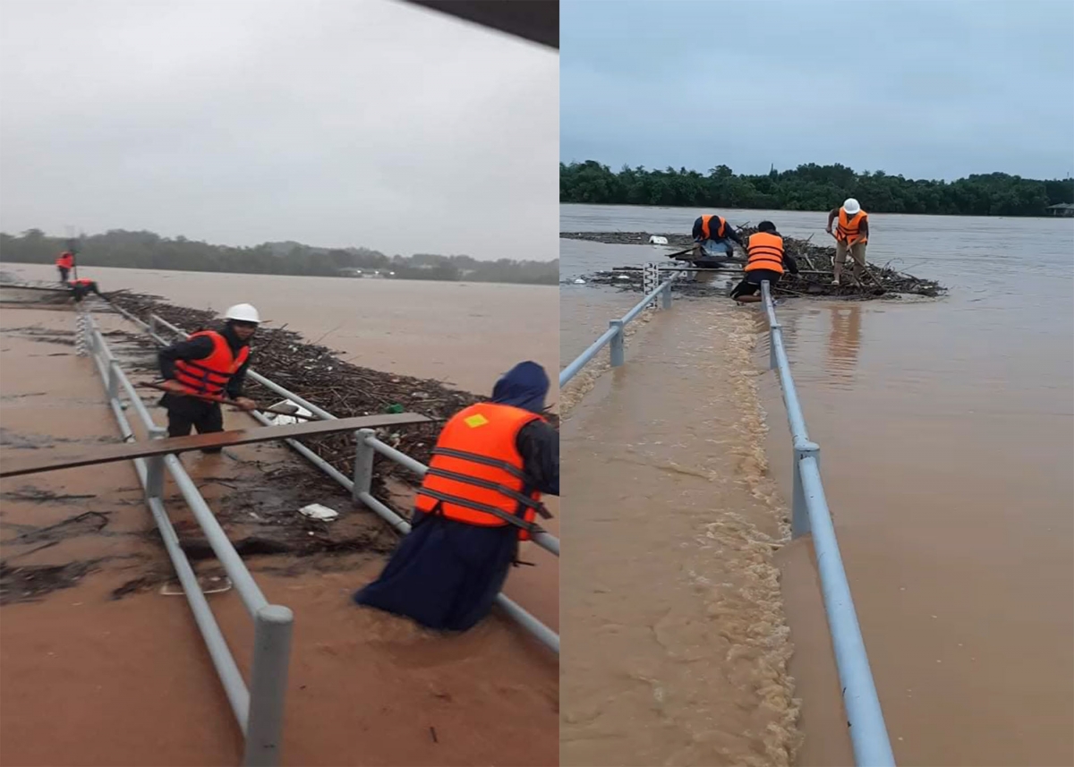 Quan trắc viên đẩy vật cản trên tuyến đo tại Trạm Thủy văn Thạch Hãn, Quảng Trị trong ngày 8/10/2020.