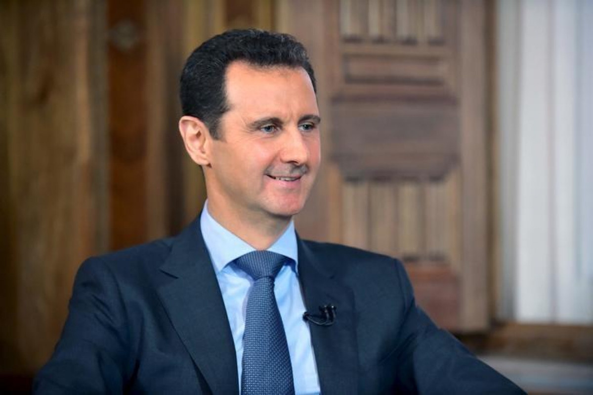 Tổng thống Al-Assad khẳng định chính phủ đang nỗ lực để mọi người tị nạn trở về và đóng góp xây dựng quê hương. Ảnh: Reuters