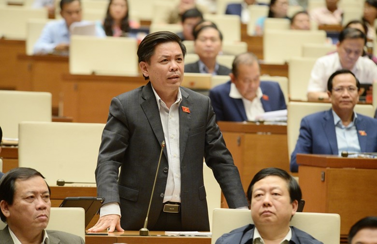 Bộ trưởng Bộ Giao thông vận tải Nguyễn Văn Thể trả lời chất vấn của các đại biểu Quốc hội. Ảnh: Quốc hội