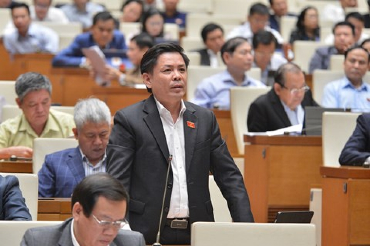 Bộ trưởng Bộ Giao thông Vận tải Nguyễn Văn Thể trả lời chất vấn của các đại biểu Quốc hội. Ảnh: Quốc hội