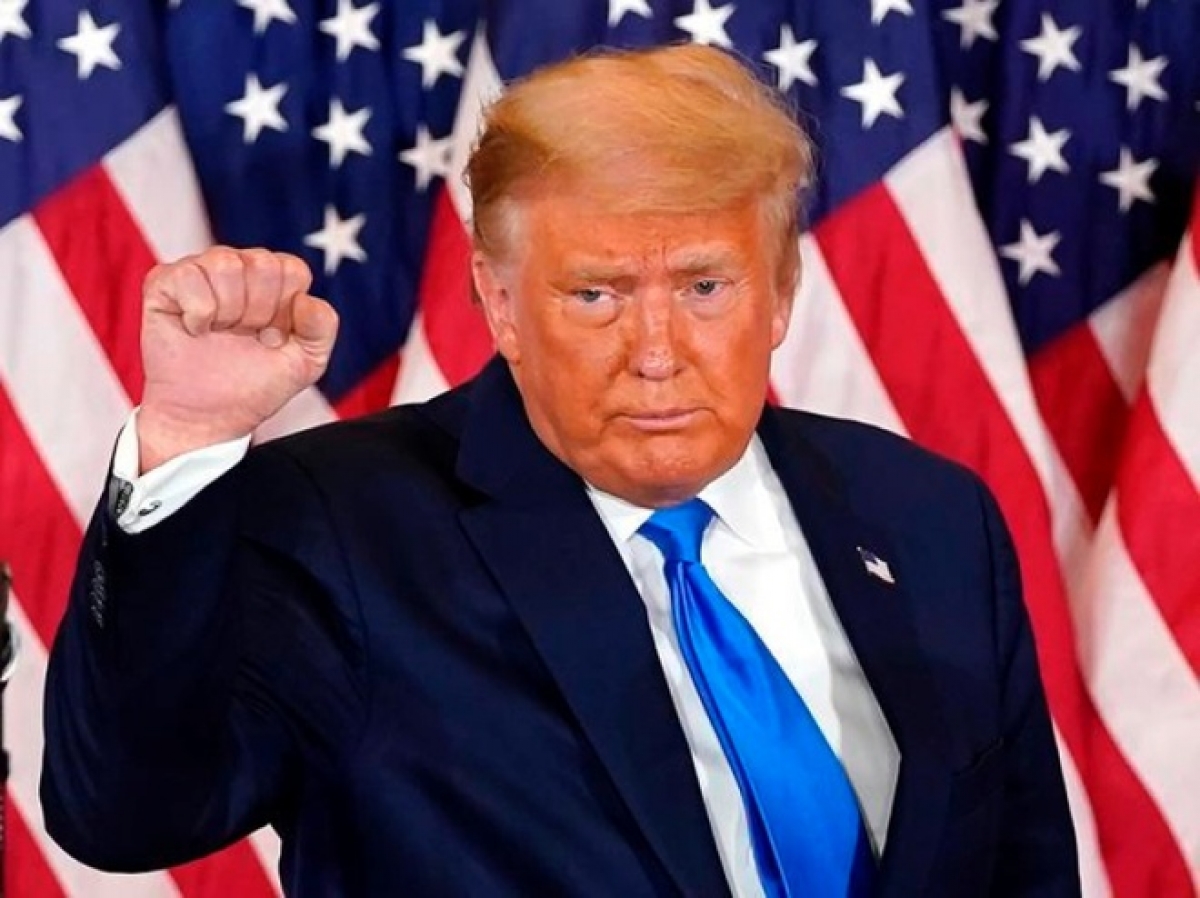 Với 3 phiếu đại cử tri của bang Alaska, Tổng thống Donald Trump hiện có 217 phiếu đại cử tri. Hơn 71 triệu người dân đã bầu cho đương kim tổng thống trong cuộc bầu cử 2020. Ảnh: Reuters.
