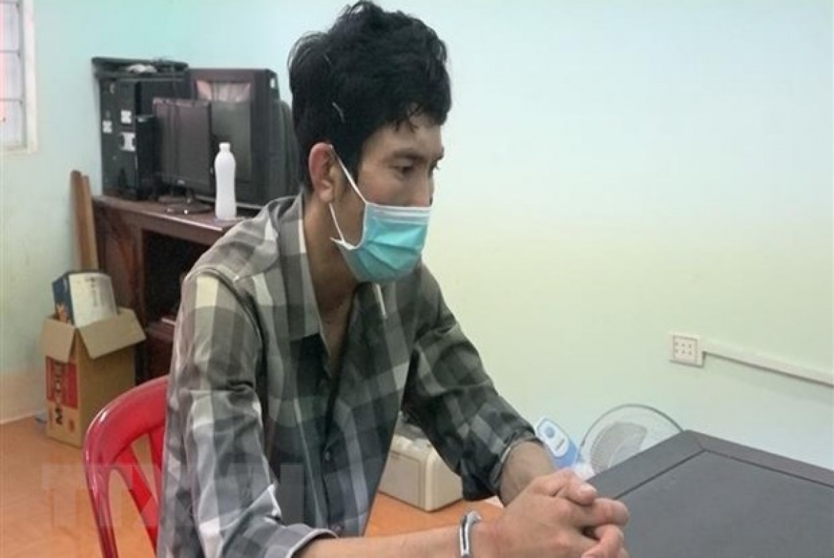 Đối tượng Cương tại cơ quan công an. (Ảnh: TTXVN)