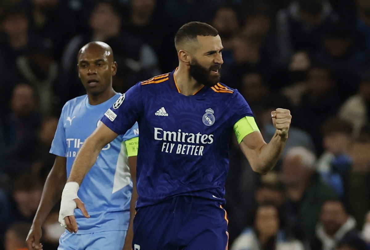 Benzema ghi cú đúp vào lưới Man City dể duy trì cơ hội cho Real Madrid. (Ảnh: Reuters).