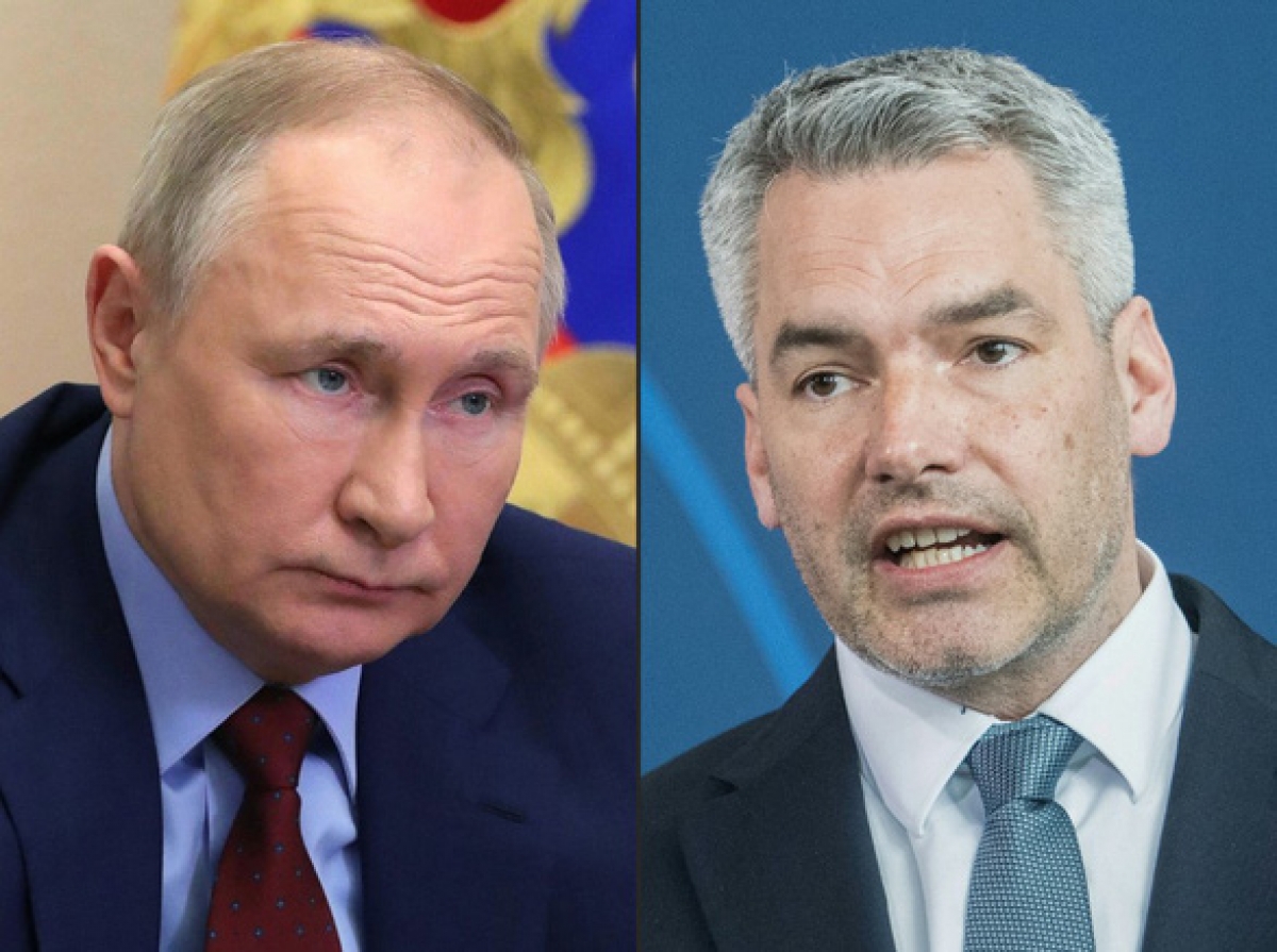 Tổng thống Nga Vladimir Putin (trái) và Thủ tướng Áo Karl Nehammer - Ảnh: AFP