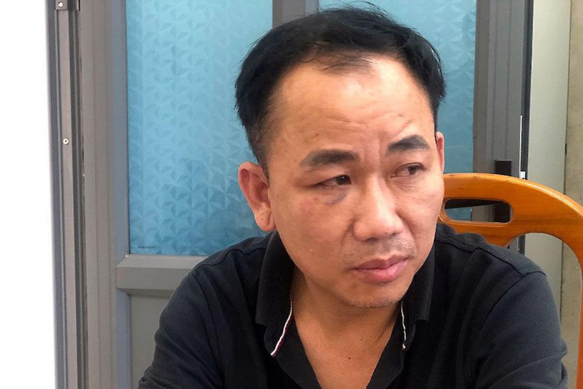 Phạm Văn Nam tại cơ quan điều tra. Ảnh: BT