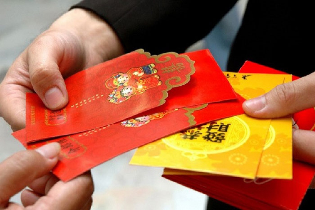 Đừng để lì xì thành gánh nặng ngày tết hình ảnh 1 Dung de li xi thanh ganh nang ngay tet hinh anh 1