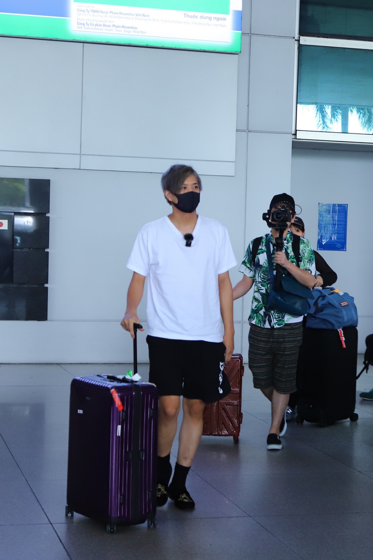 Japanese actor Masahiro Inoue arrives on the morning of July 26 at Tan Son Nhat International Airport in Ho Chi Minh City.
