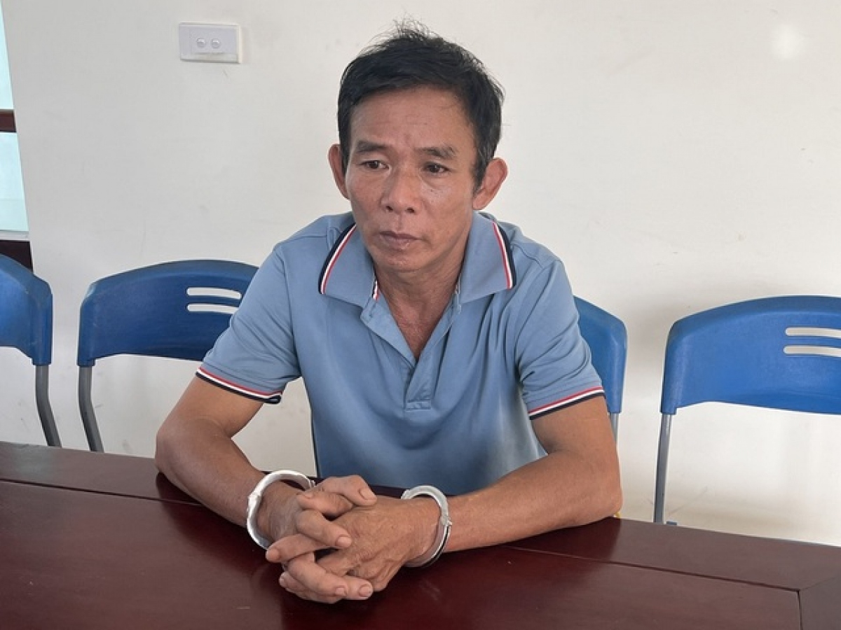 Lê Văn Tình tại cơ quan công an. Ảnh: Công an cung cấp