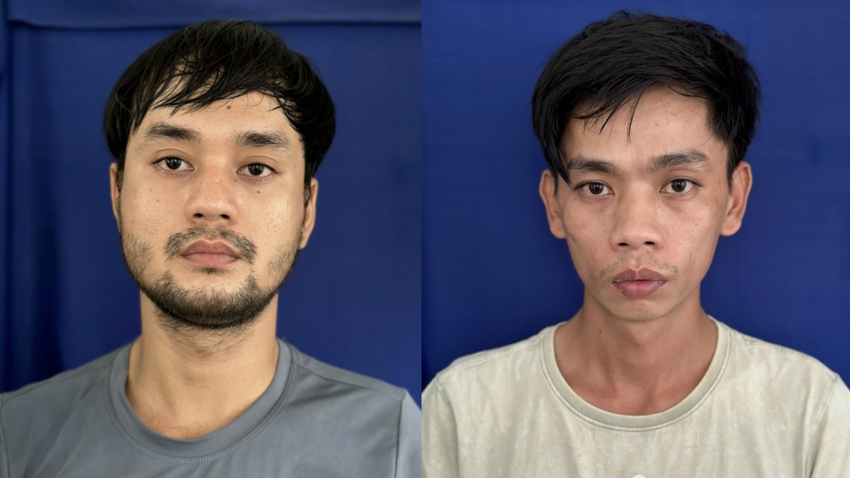 Phan Thanh Điệp (trái) và Lê Quốc Vinh tại cơ quan điều tra.