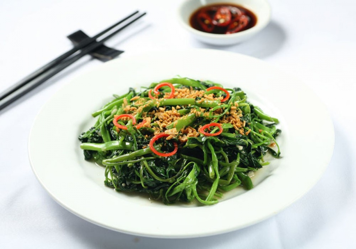 Rau muống xào tỏi (stir-fried water spinach with garlic) is a favourite among the numerous delicacies of Hanoi. The dish showcases the sublime combination of fresh water spinach, garlic, and various seasonings.