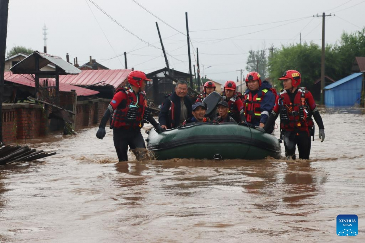 Mưa lũ ở Hắc Long Giang. Ảnh: Tân Hoa xã