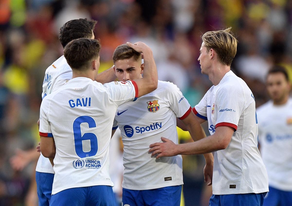 Khoảnh khắc tỏa sáng của những ngôi sao giúp Barca thắng trận 4-3. (Ảnh: Reuters). 
