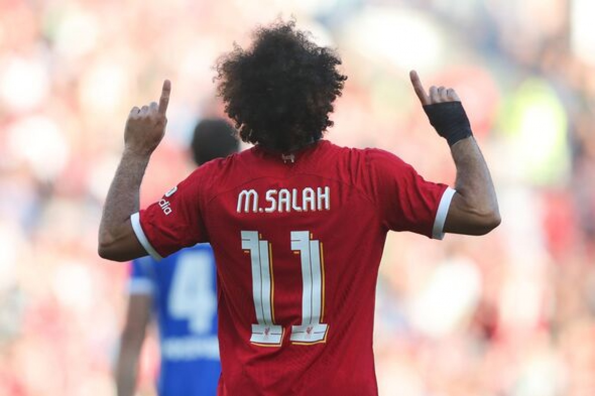 Salah không có ý định rời Liverpool (Ảnh: Getty)