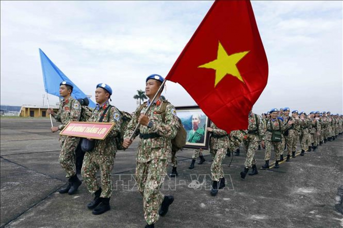 Lực lượng gìn giữ hòa bình Việt Nam xuất quân tại Sân bay quốc tế Nội Bài (Hà Nội), lên đường thực hiện nhiệm vụ của LHQ tại Phái bộ UNISFA. (Ảnh: An Đăng/TTXVN)