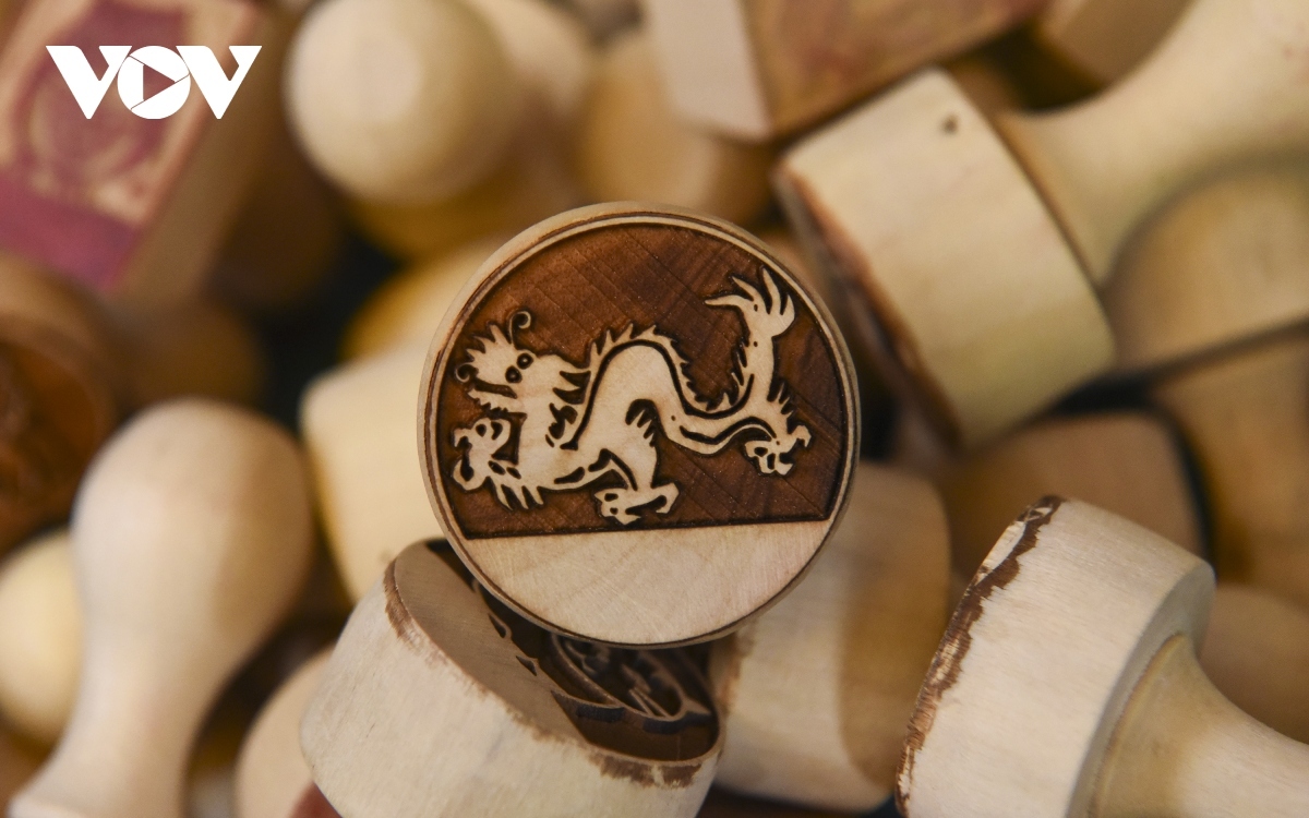 The hand-carved wood stamps require more effort compared to the manufactured ones, the artisan says.