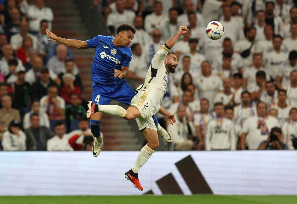 Real Madrid gặp rất nhiều khó khăn trước lối chơi rắn của đối thủ (Ảnh: Reuters).