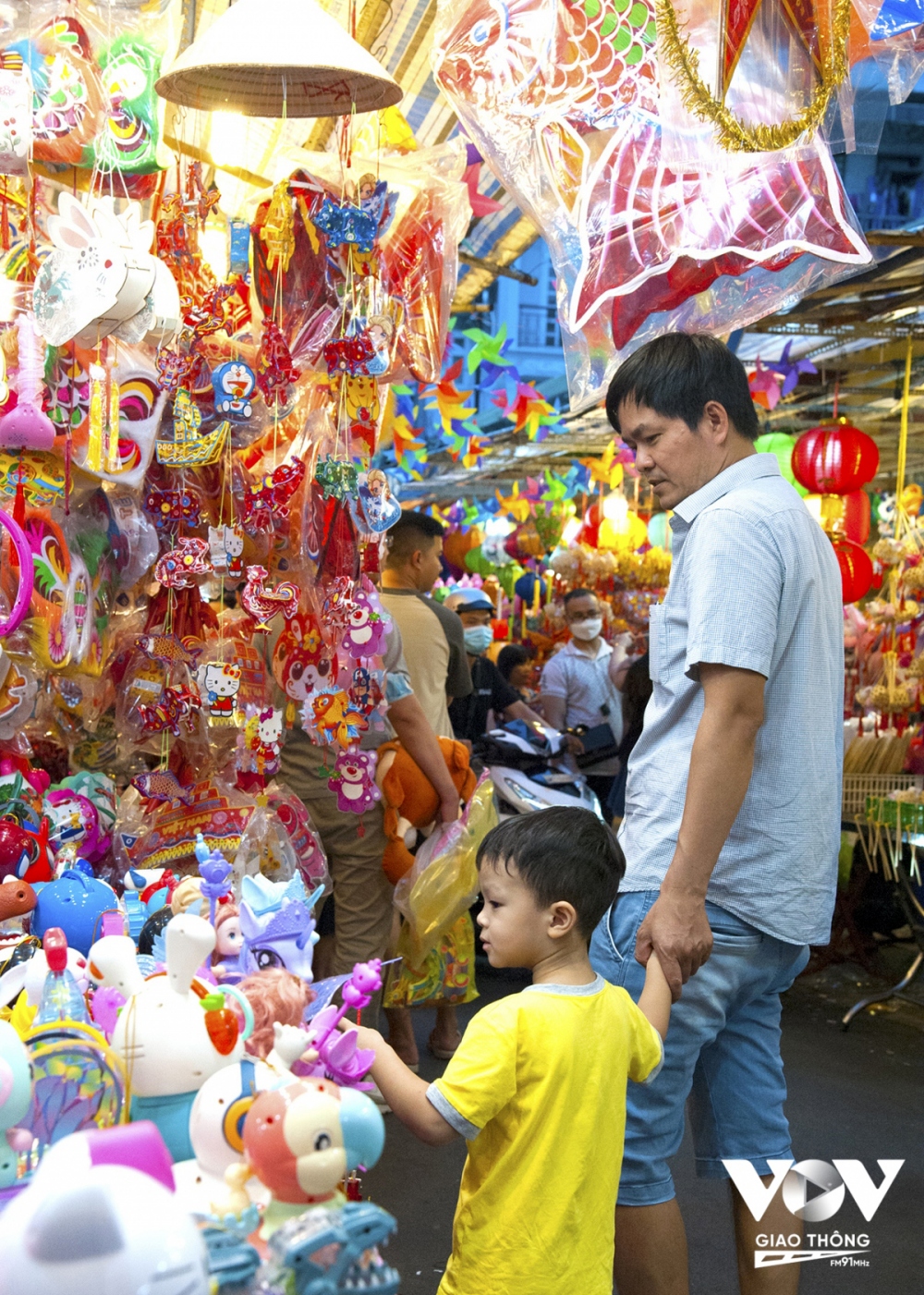 Minh Phan, a resident of District 7, says not only my son but I myself also like to explore this street when the festival is drawing near.