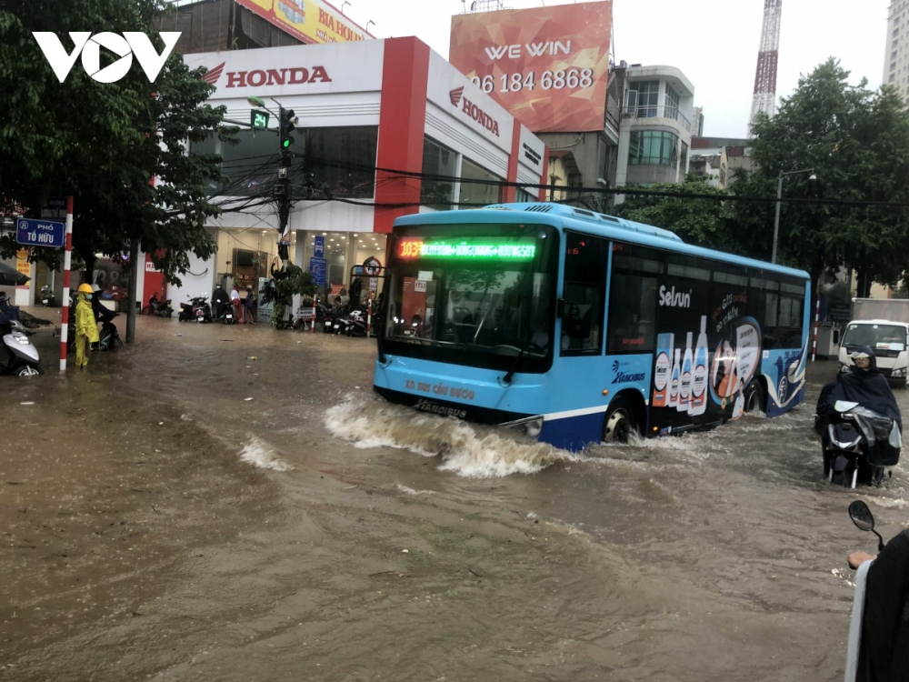 The heavy downpour has left many streets deep under water, disrupting traffic throughout the city.