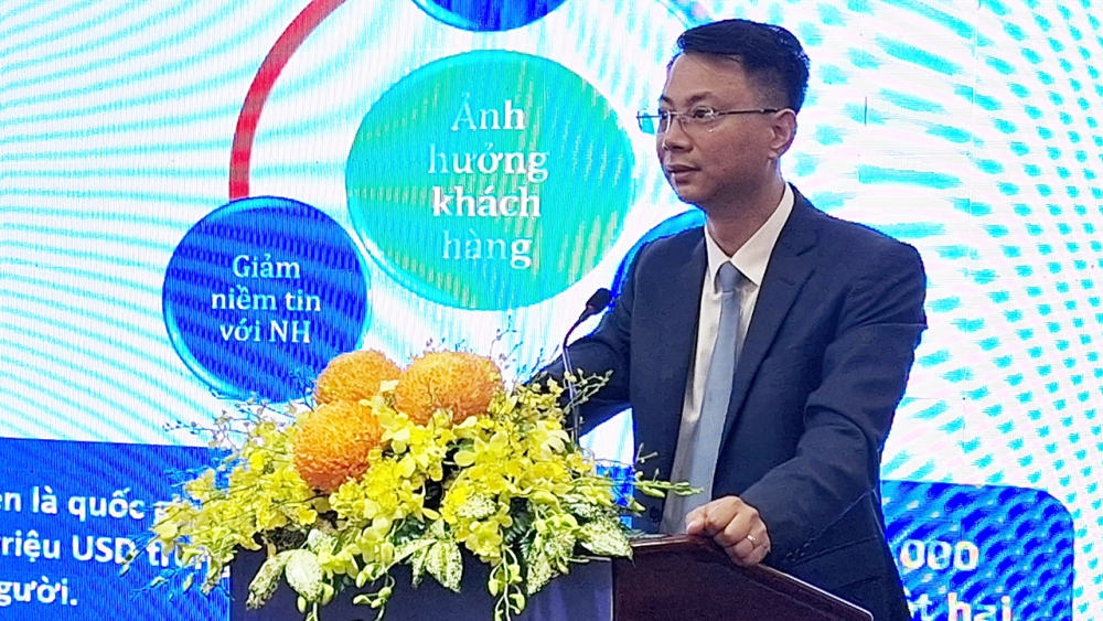 Ông Lê Anh Dũng, Phó Vụ trưởng Vụ Thanh toán Ngân hàng Nhà nước phát biểu tại hội thảo - Ảnh: Lệ Hằng