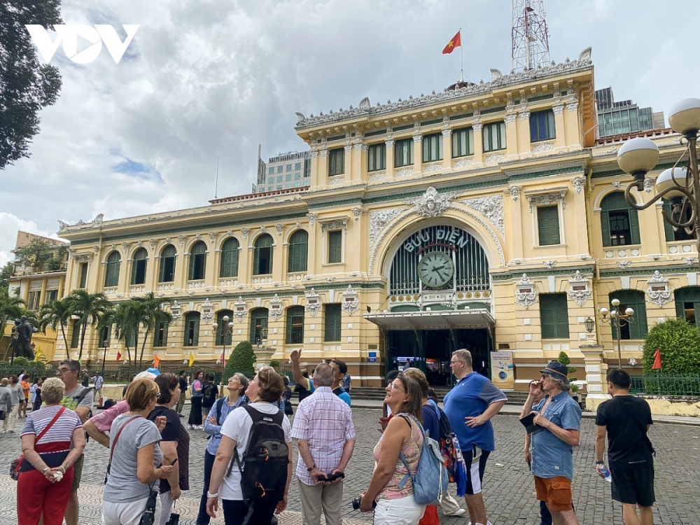 International tourists visit Saigon Central Post Office in Ho Chi Minh City