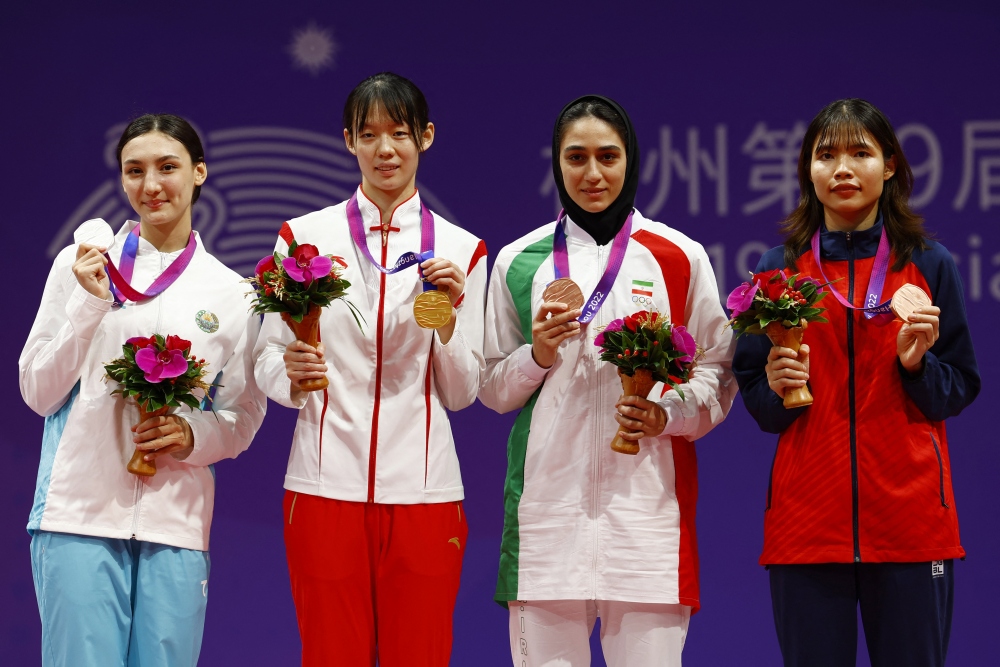 Bạc Thị Khiêm trên bục nhận huy chương. (Ảnh: Reuters). 