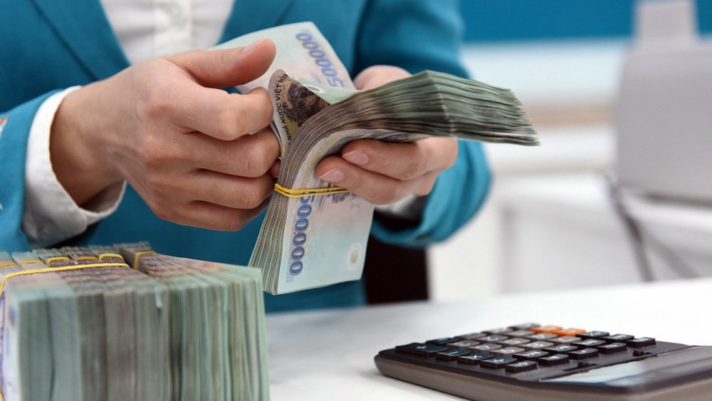 Từ đầu tháng 9 đến nay, đã có khoảng 21 ngân hàng giảm lãi suất - Ảnh minh họa: Người lao động