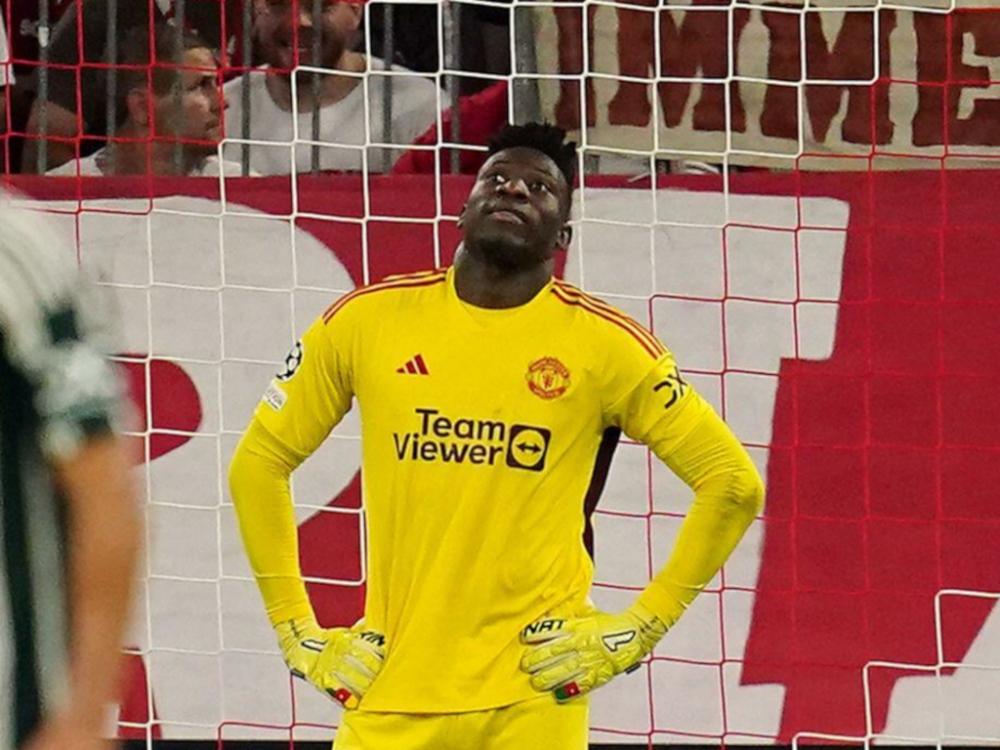 Onana thất thần sau màn trình diễn đáng quên trước Bayern Munich. (Ảnh: Getty)
